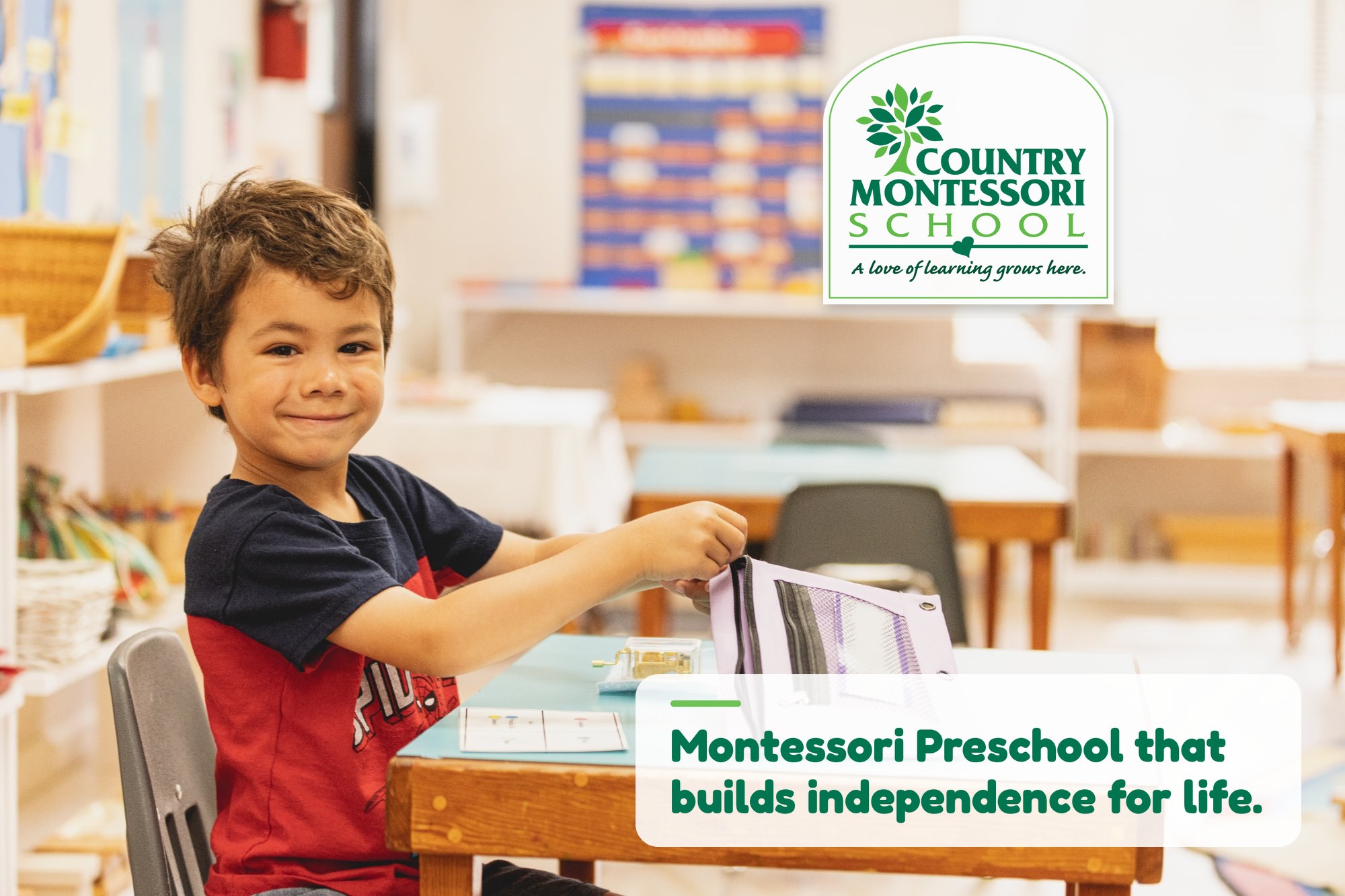 Smiling preschooler working with Montessori materials in a Country Montessori School classroom in Poway, CA
